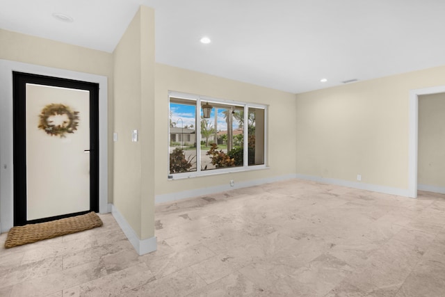 entrance foyer with recessed lighting, baseboards, and visible vents