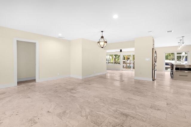 unfurnished living room with baseboards, ceiling fan, recessed lighting, and visible vents