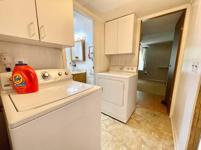 3020 SE 38th Ave, Okeechobee, FL 34974 - laundry area featuring cabinet space and washer and clothes dryer