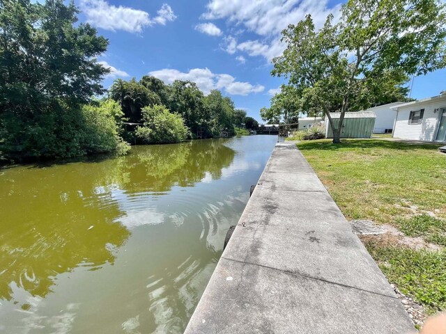 3020 SE 38th Ave, Okeechobee, FL 34974 - exterior space with a lawn and a water view