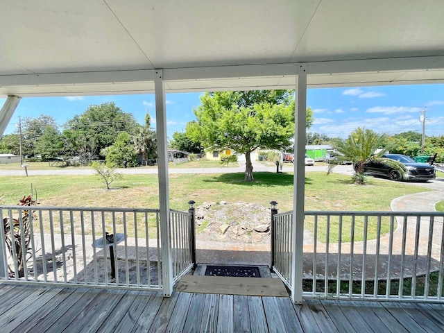 3020 SE 38th Ave, Okeechobee, FL 34974 - wooden deck featuring a lawn