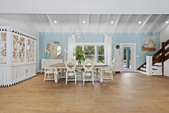 dining space featuring a chandelier, stairs, recessed lighting, light wood-type flooring, and a baseboard radiator