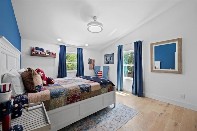 bedroom with recessed lighting, baseboards, vaulted ceiling, and light wood-style floors