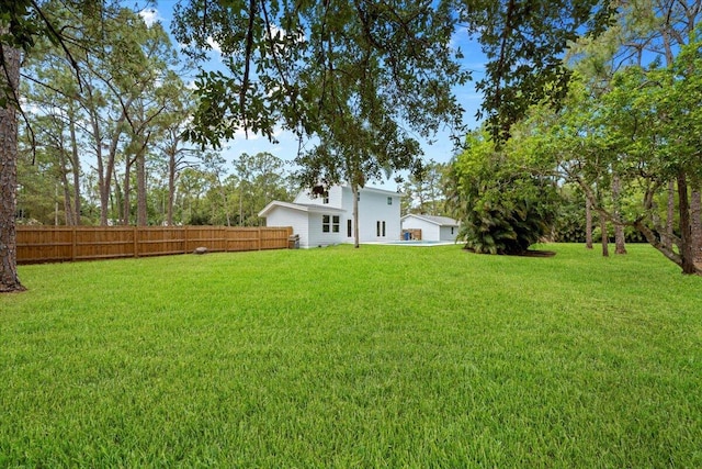 view of yard with fence