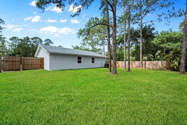 view of yard featuring a fenced backyard