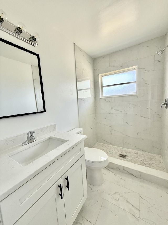 full bath featuring vanity, toilet, marble finish floor, a shower stall, and visible vents