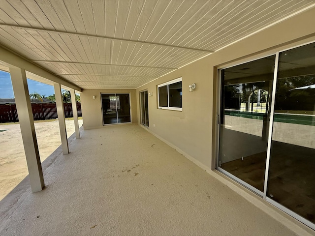 view of patio / terrace featuring fence