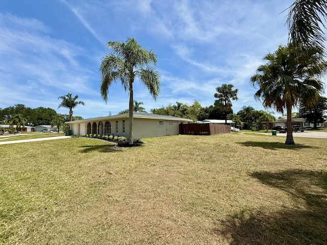 view of yard featuring fence