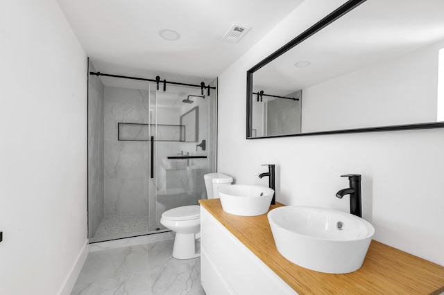 bathroom with a sink, toilet, marble finish floor, visible vents, and a stall shower