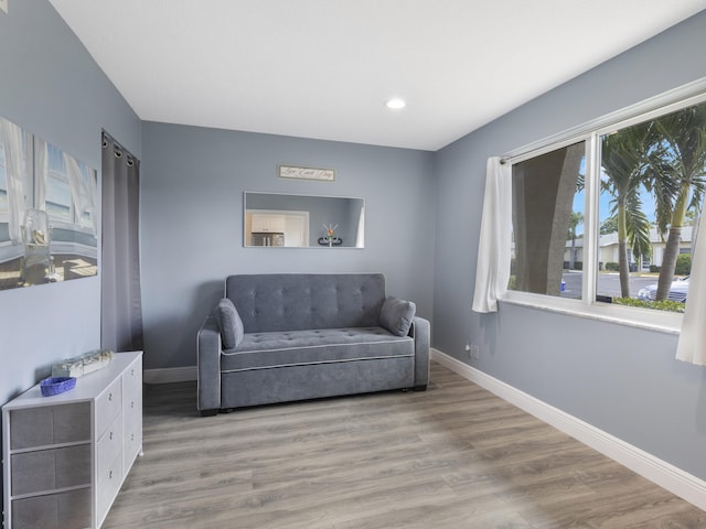 sitting room featuring recessed lighting, baseboards, and wood finished floors