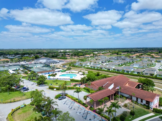 birds eye view of property with a residential view
