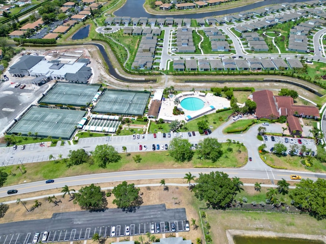 bird's eye view featuring a residential view and a water view