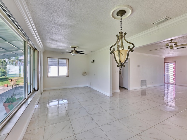 unfurnished room with a ceiling fan, baseboards, and visible vents