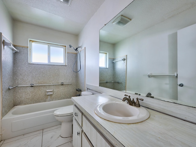 bathroom featuring vanity, toilet, plenty of natural light, and bathtub / shower combination