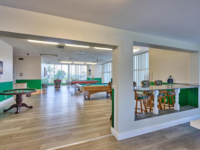 playroom with pool table, baseboards, wood finished floors, and visible vents