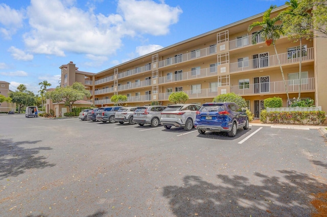 5874 Crystal Shores Dr Unit 308, Boynton Beach, FL 33437 - view of apartment building / complex with uncovered parking