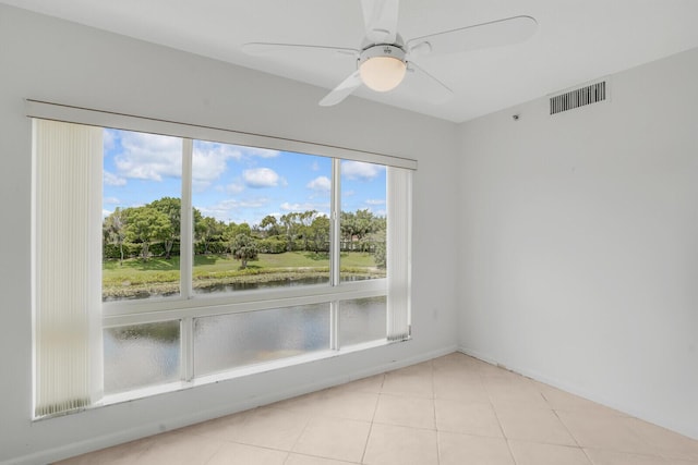 5874 Crystal Shores Dr Unit 308, Boynton Beach, FL 33437 - tiled spare room with a water view, a ceiling fan, and view of wooded area