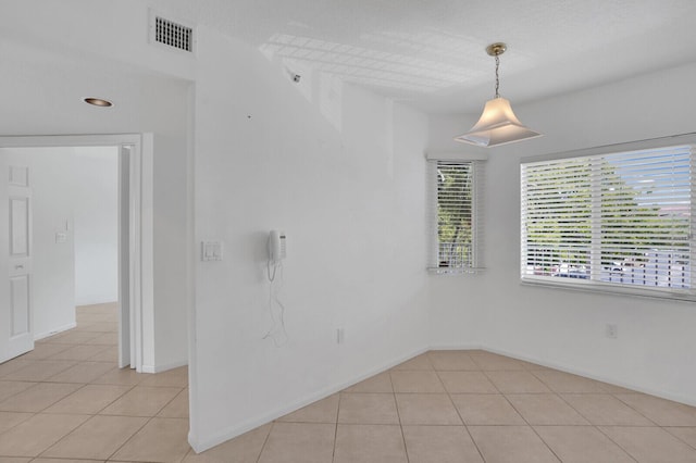 5874 Crystal Shores Dr Unit 308, Boynton Beach, FL 33437 - empty room featuring light tile patterned flooring and baseboards