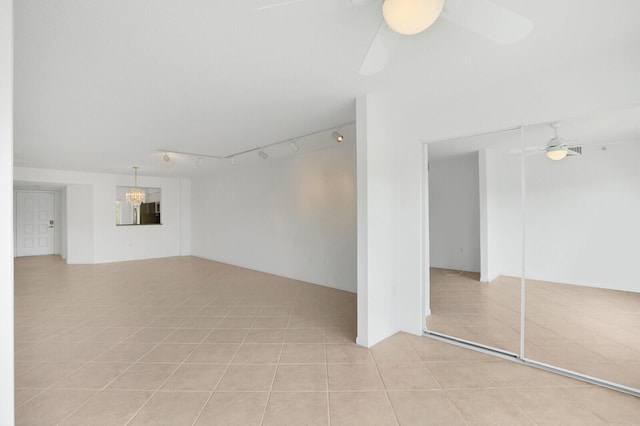 5874 Crystal Shores Dr Unit 308, Boynton Beach, FL 33437 - unfurnished living room with ceiling fan, light tile patterned flooring, and track lighting