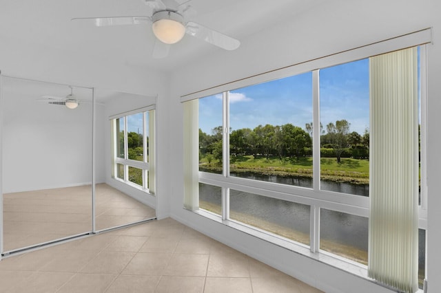 5874 Crystal Shores Dr Unit 308, Boynton Beach, FL 33437 - unfurnished sunroom featuring a water view and view of wooded area