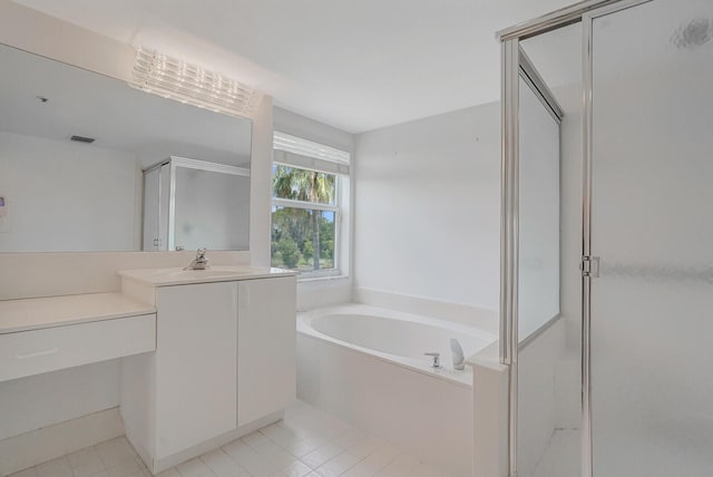 5874 Crystal Shores Dr Unit 308, Boynton Beach, FL 33437 - bathroom with a shower stall, a bath, vanity, and tile patterned floors