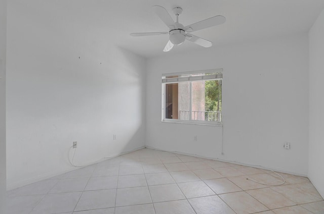5874 Crystal Shores Dr Unit 308, Boynton Beach, FL 33437 - spare room with ceiling fan and light tile patterned flooring