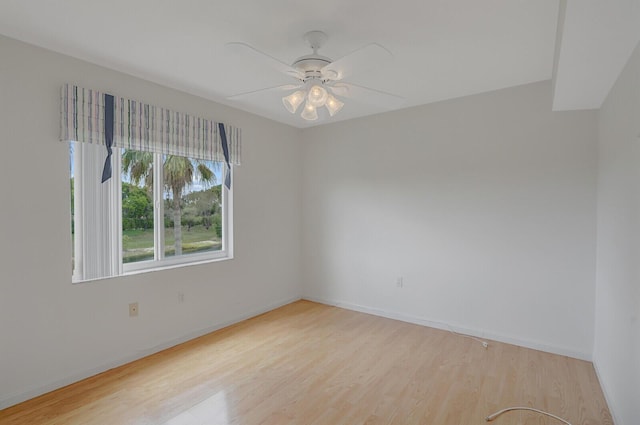 5874 Crystal Shores Dr Unit 308, Boynton Beach, FL 33437 - spare room featuring light wood-style floors, baseboards, and a ceiling fan