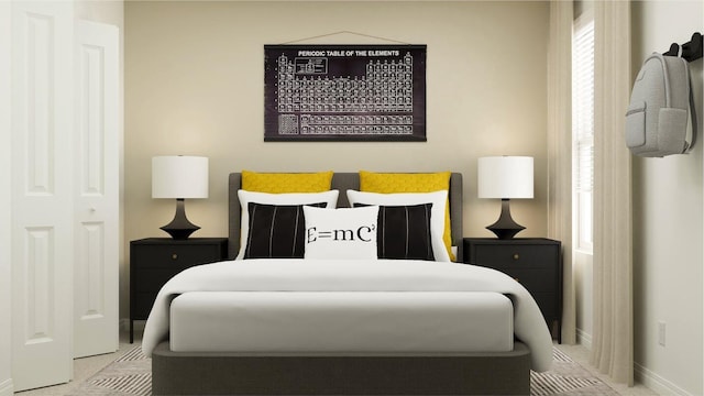 bedroom featuring carpet floors and baseboards