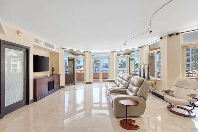 300 SE 5th Ave Unit 2050, Boca Raton, FL 33432 - interior space with a wealth of natural light, french doors, marble finish floor, and visible vents