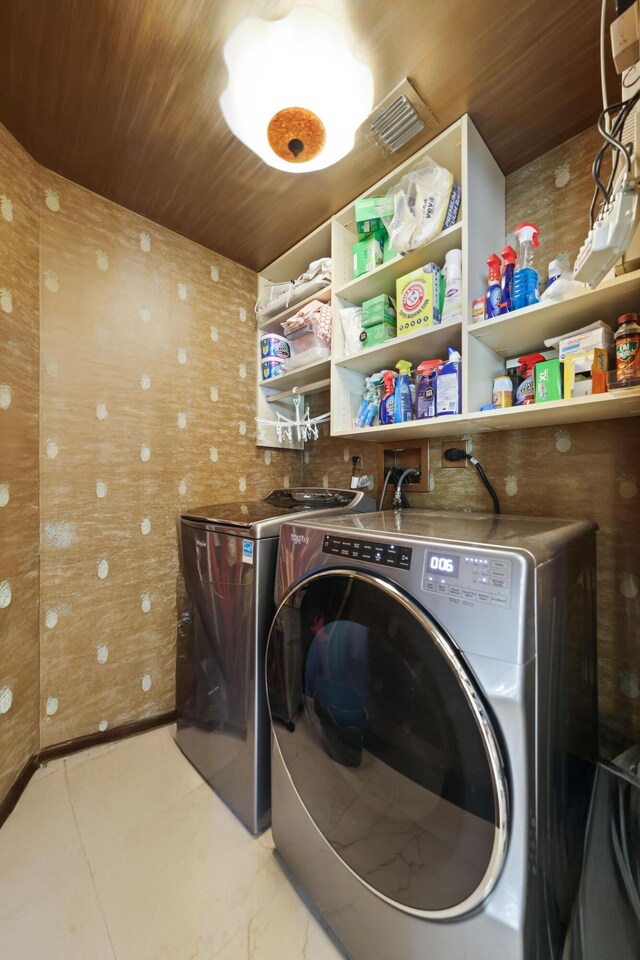 300 SE 5th Ave Unit 2050, Boca Raton, FL 33432 - washroom with washer and dryer, laundry area, wooden ceiling, and visible vents