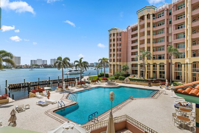 300 SE 5th Ave Unit 2050, Boca Raton, FL 33432 - community pool featuring a patio and a water view