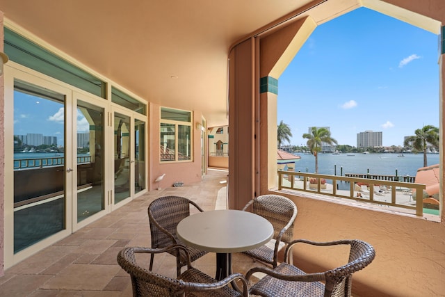 300 SE 5th Ave Unit 2050, Boca Raton, FL 33432 - balcony featuring a water view and french doors
