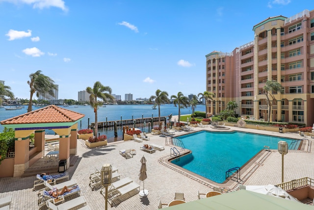 300 SE 5th Ave Unit 2050, Boca Raton, FL 33432 - pool with a water view and a patio