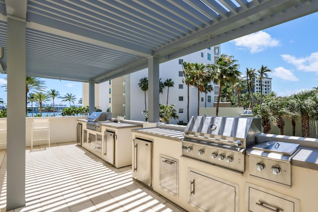 300 SE 5th Ave Unit 2050, Boca Raton, FL 33432 - view of patio / terrace with area for grilling and exterior kitchen