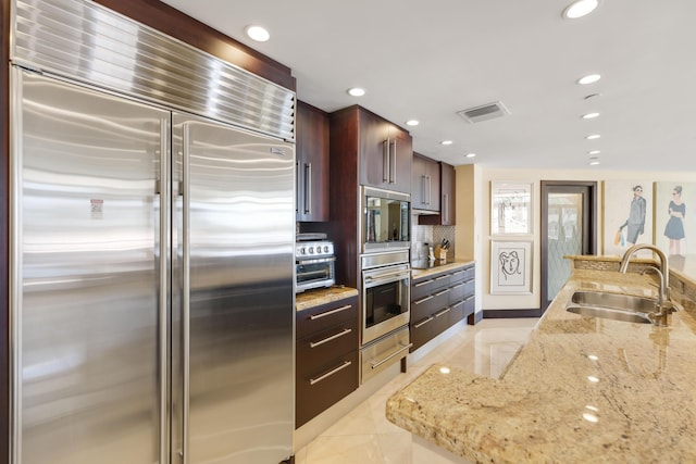 300 SE 5th Ave Unit 2050, Boca Raton, FL 33432 - kitchen featuring a sink, visible vents, built in appliances, a warming drawer, and recessed lighting