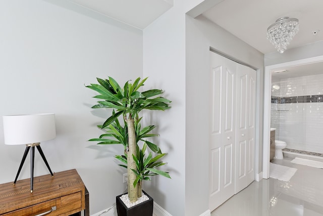 255 NE 3rd Ave Unit 2501, Delray Beach, FL 33444 - hallway with tile patterned floors and baseboards
