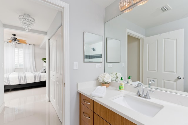 255 NE 3rd Ave Unit 2501, Delray Beach, FL 33444 - ensuite bathroom featuring vanity, ensuite bath, a ceiling fan, visible vents, and tile patterned flooring