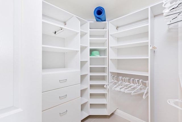 255 NE 3rd Ave Unit 2501, Delray Beach, FL 33444 - walk in closet with tile patterned flooring