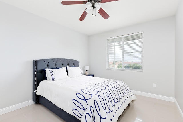 255 NE 3rd Ave Unit 2501, Delray Beach, FL 33444 - tiled bedroom featuring a ceiling fan and baseboards