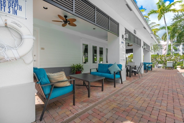 255 NE 3rd Ave Unit 2501, Delray Beach, FL 33444 - view of patio with outdoor lounge area, a ceiling fan, outdoor dining space, and french doors