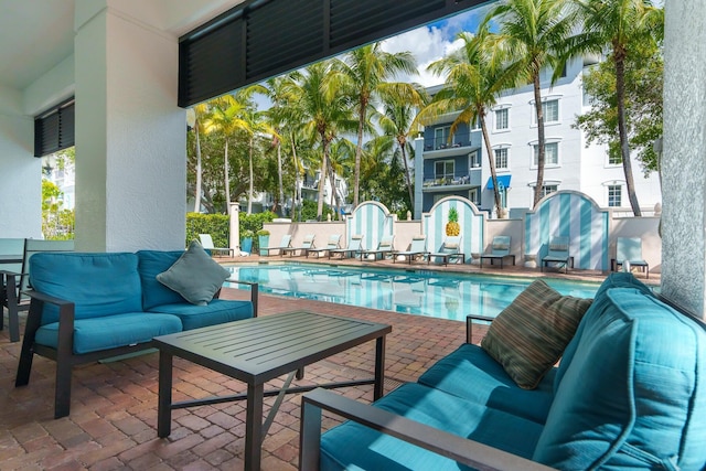 255 NE 3rd Ave Unit 2501, Delray Beach, FL 33444 - view of swimming pool with a patio, outdoor lounge area, and a fenced in pool