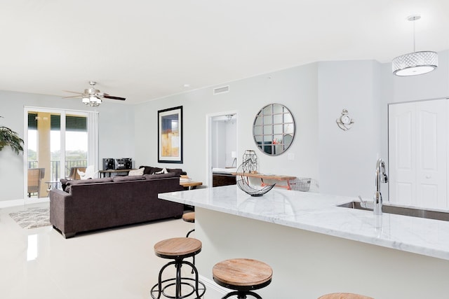 255 NE 3rd Ave Unit 2501, Delray Beach, FL 33444 - living room with visible vents, light tile patterned floors, and a ceiling fan