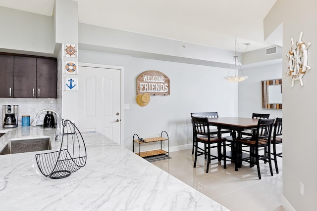 255 NE 3rd Ave Unit 2501, Delray Beach, FL 33444 - dining room featuring baseboards, visible vents, and light tile patterned flooring