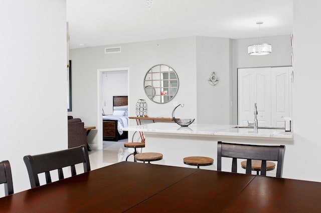 255 NE 3rd Ave Unit 2501, Delray Beach, FL 33444 - dining area with light tile patterned floors and visible vents