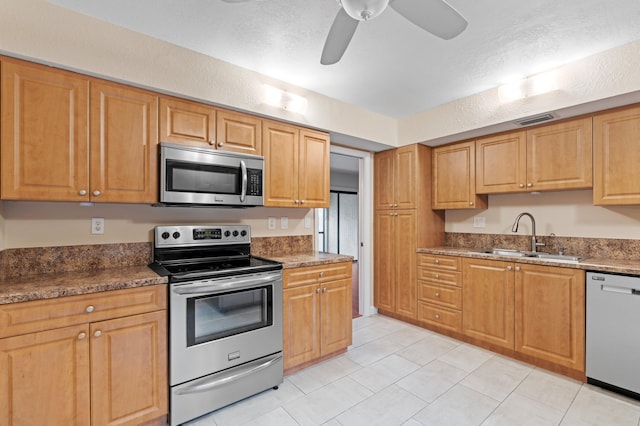 6534 Spring Bottom Way Unit 123, Boca Raton, FL 33433 - kitchen featuring visible vents, a ceiling fan, light tile patterned flooring, a sink, and stainless steel appliances