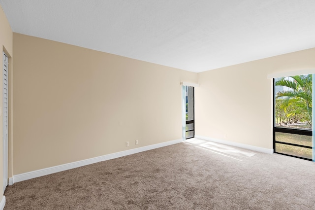 6534 Spring Bottom Way Unit 123, Boca Raton, FL 33433 - empty room featuring carpet floors and baseboards