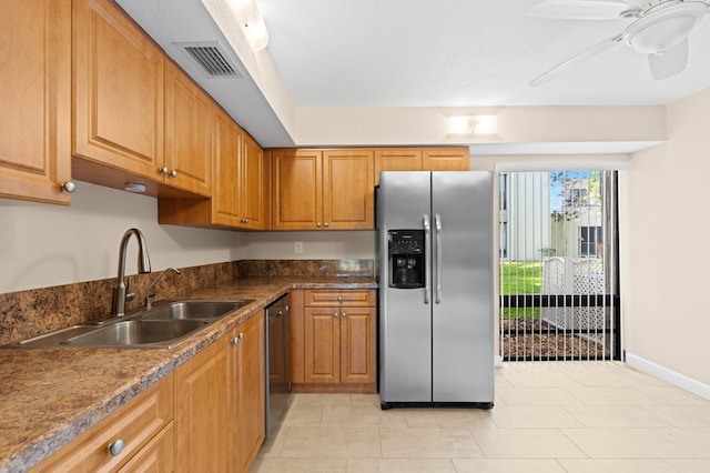 6534 Spring Bottom Way Unit 123, Boca Raton, FL 33433 - kitchen with brown cabinetry, a ceiling fan, visible vents, appliances with stainless steel finishes, and a sink