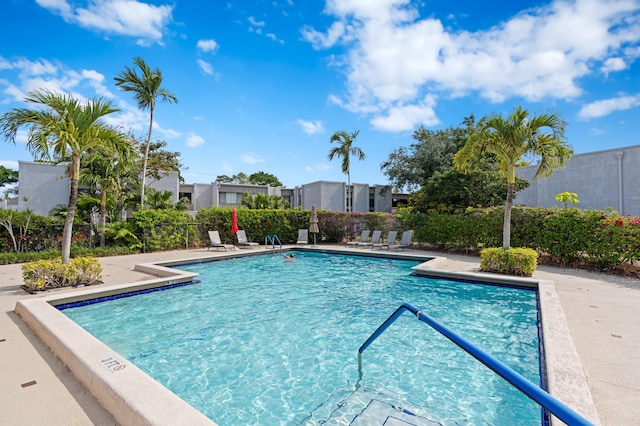 6534 Spring Bottom Way Unit 123, Boca Raton, FL 33433 - pool featuring fence, a patio, and a residential view