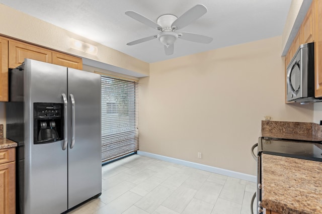 6534 Spring Bottom Way Unit 123, Boca Raton, FL 33433 - kitchen featuring baseboards, a ceiling fan, and stainless steel appliances