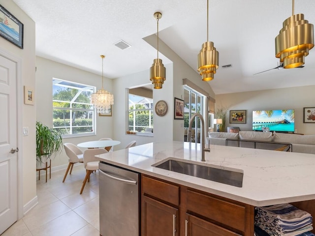 6000 Venetto Way, Vero Beach, FL 32967 - kitchen with visible vents, stainless steel dishwasher, open floor plan, and a sink